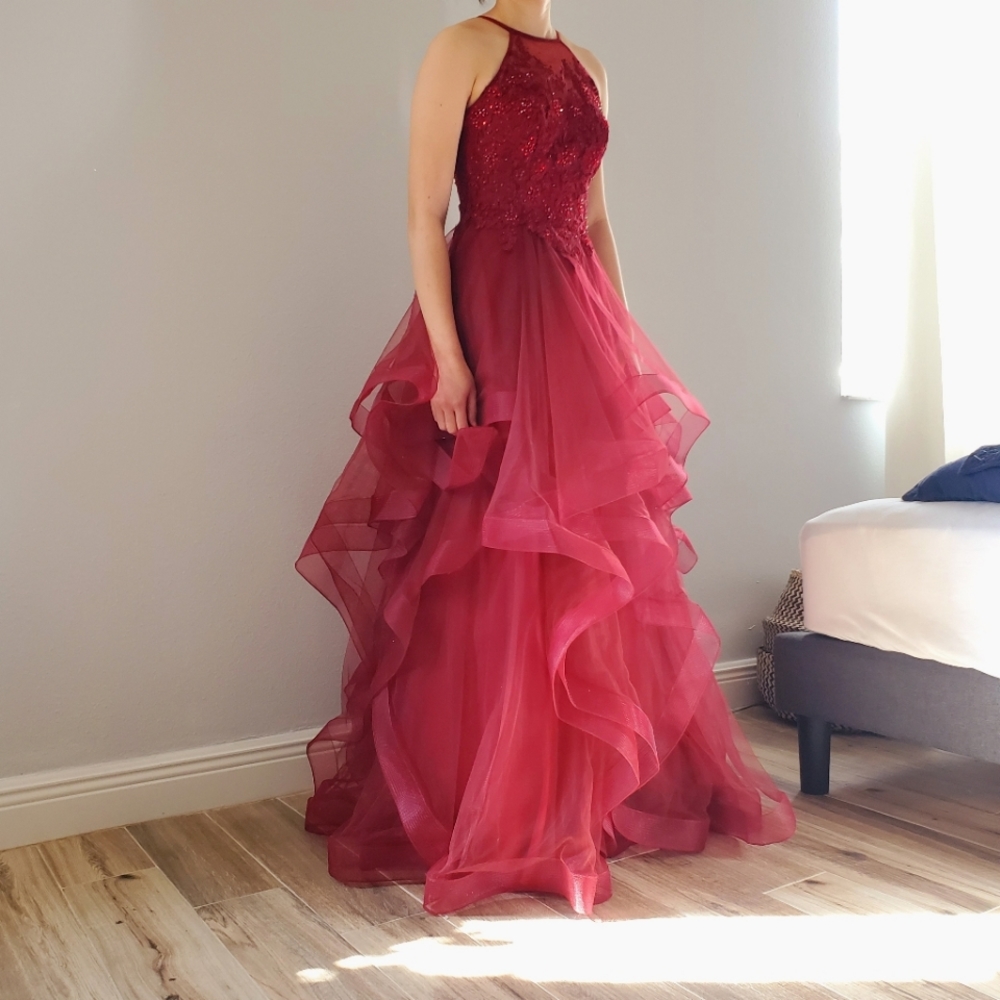 Red formal dress. Bought from Camille La Vie two years ago. Excellent condition.